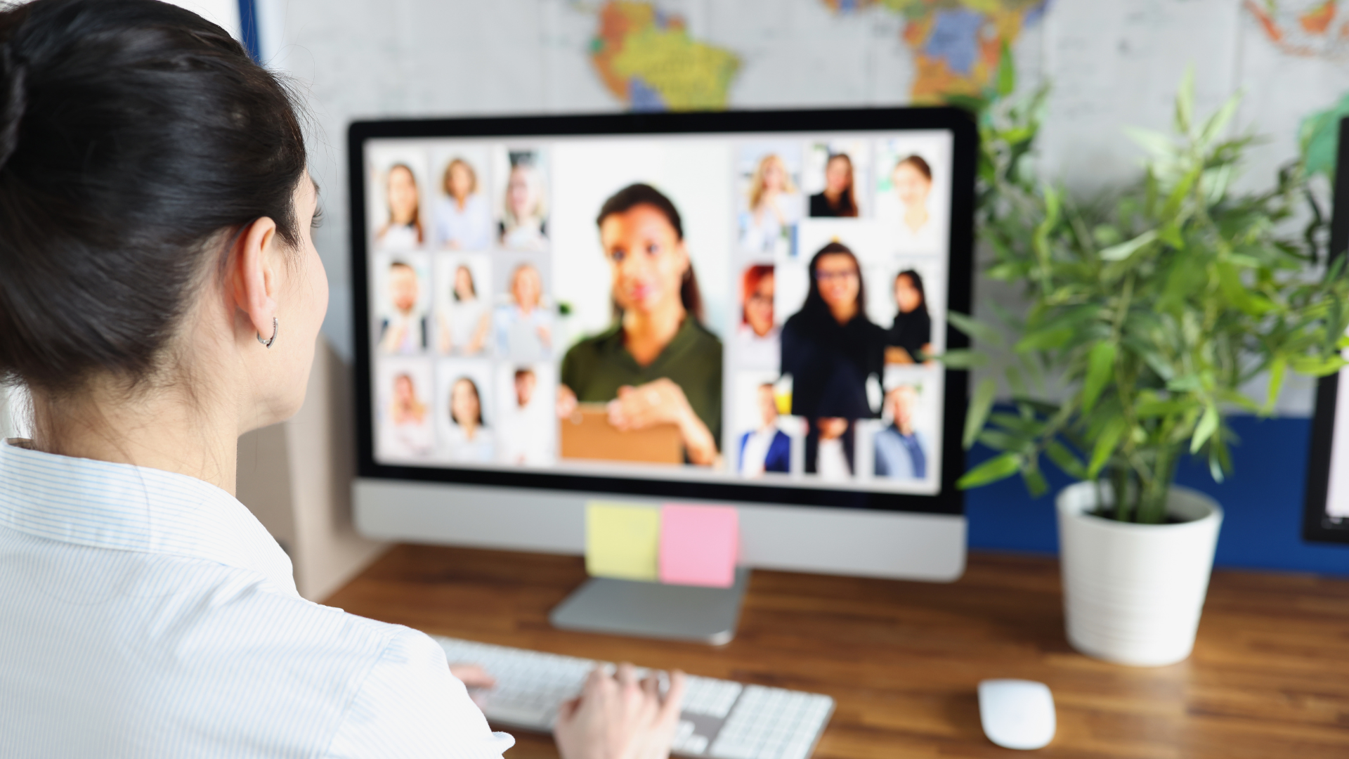 A diverse group of remote employees collaborating via video conferencing